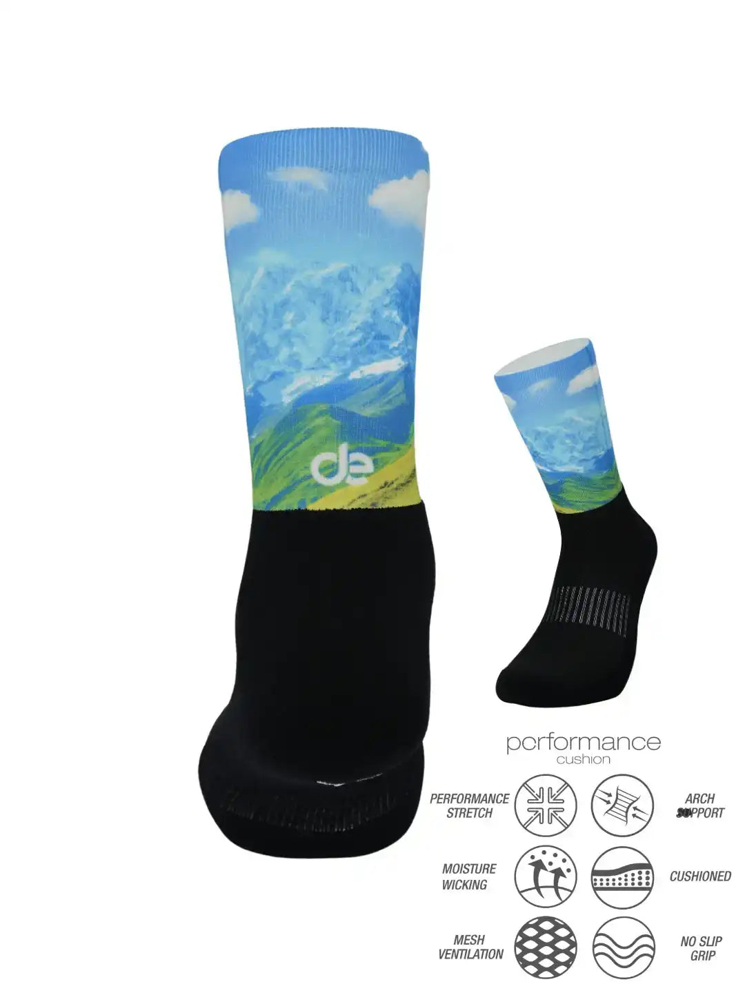 Performance athletic socks with mountain design, moisture-wicking, cushioned, and arch support for running or cycling.
