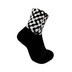 Black athletic sock with white abstract pattern, ideal for running, cycling, tennis, or training