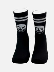 Black athletic socks with white skull graphic and stripes, ideal for running, cycling, or training.