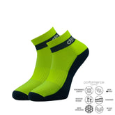 Bright green athletic performance socks with black accents and moisture-wicking features